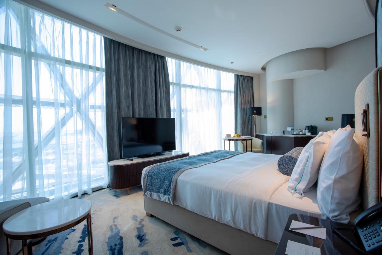 Century Marina Hotel - Lusail Exterior foto A bedroom at the hotel