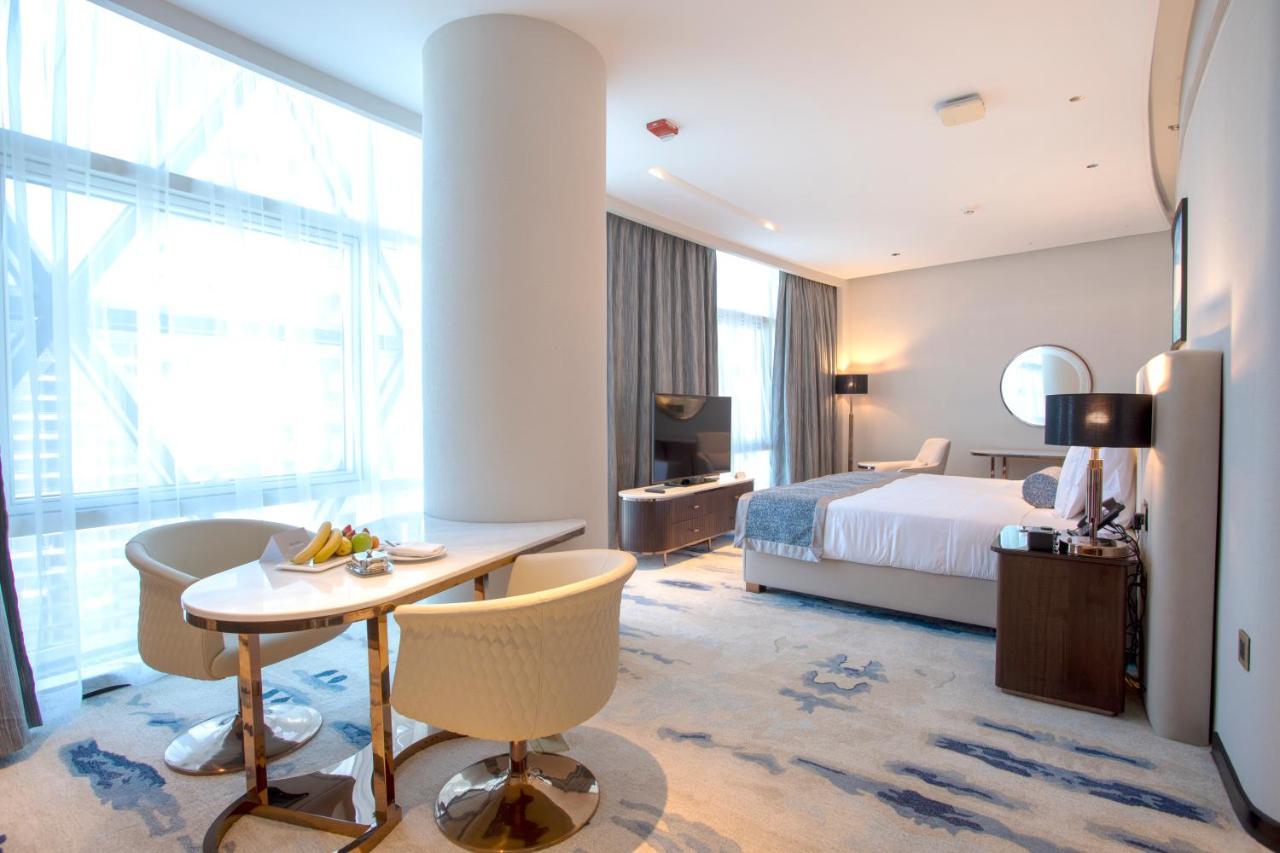 Century Marina Hotel - Lusail Exterior foto A suite at the hotel